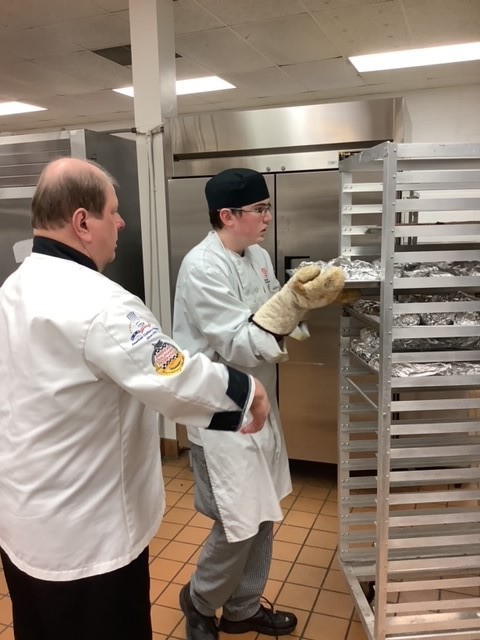 Chef Roebuck and Culinary Student