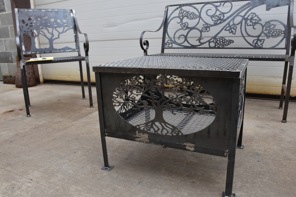 black steel firepit, bench and chair