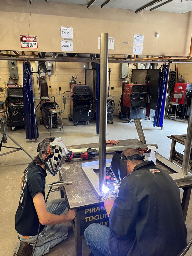 helping other instructors with welding around the building