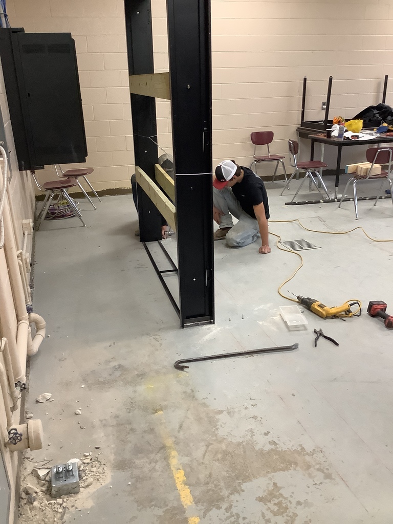 Masonry student classroom demo/addition updates with door installation