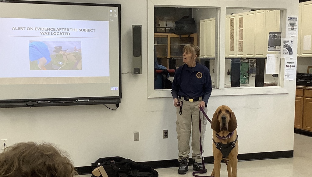 Terri Heck from the Summit Search and Rescue along with Detective K9 Stratton 