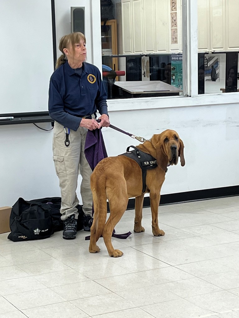 Terri Heck from the Summit Search and Rescue along with Detective K9 Stratton 