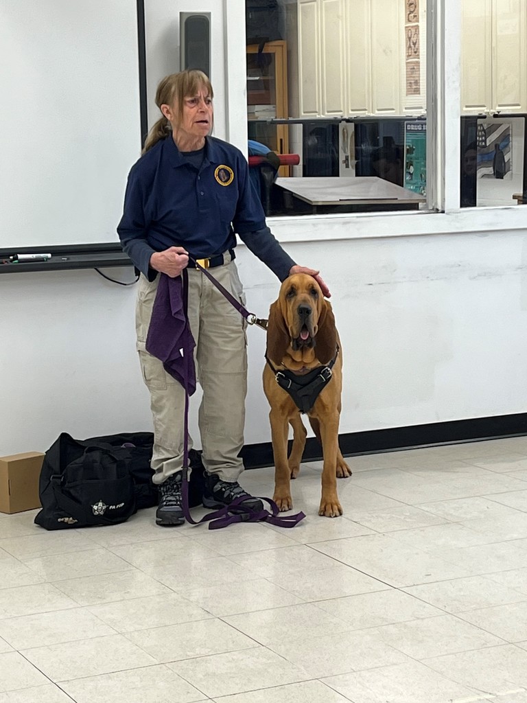 Terri Heck from the Summit Search and Rescue along with Detective K9 Stratton
